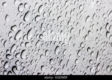 water drops on the car window abstract background Stock Photo