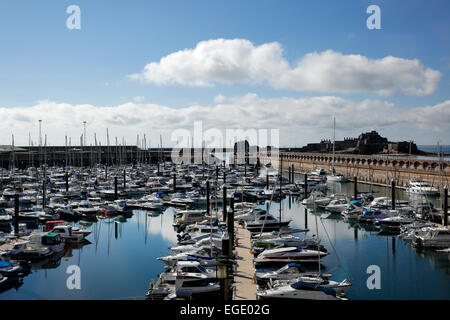 Yachts and motorboats are moored in the marina in St. Helier, Jersey UK Stock Photo