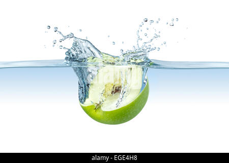 half green apple splashes into water Stock Photo