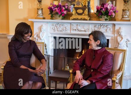 US First Lady Michelle Obama hosts a tea with Mrs. Rula Ghani, First Lady of the Islamic Republic of Afghanistan in the Yellow Oval Room of the White House February 23, 2015 in Washington, DC. Stock Photo