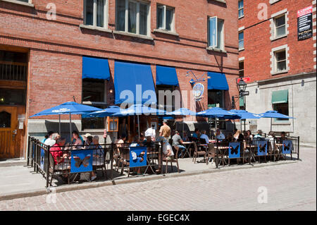 People eating on a terrace, Old Montreal, province of Quebec, Canada. Stock Photo