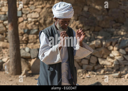 Man Praying At The Monday Market, Keren Stock Photo