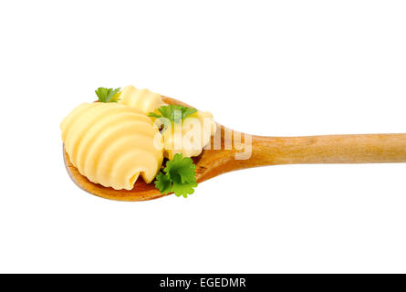 Butter curls on wooden spoon Stock Photo