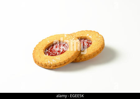 Shortbread cookies filled with red currant preserve called Linzer Eyes Stock Photo