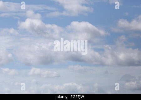 blue sky and clouds on bright day for the background. Stock Photo