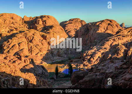 Mountain range in Sinai Peninsula, Egypt, lit by rising sun. Stock Photo