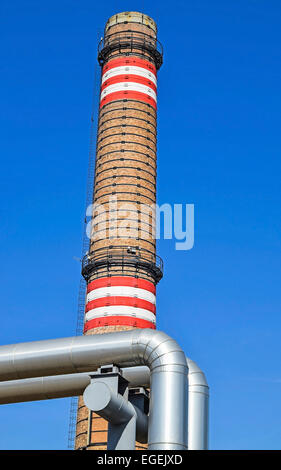 Pipes and smoke stack of the power station Stock Photo