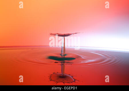 Two water drops colliding and forming a columnar structure Stock Photo