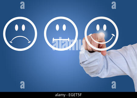 Businessman gives a positive vote for service quality with a smiley Stock Photo