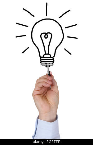 Businessman drawing a light bulb as a symbol of a business idea Stock Photo