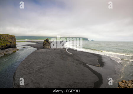 Beautiful view from Dyrholavegur, of black volcanic sand beach in Vik, Iceland Stock Photo