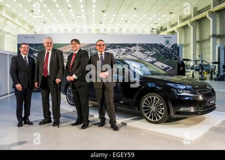 Kvasiny, Czech Republic. 20th Feb, 2015. From left to right Member of the Board of Management for Human Resources Management Bohdan Wojnar, Czech President Milos Zeman, governor of Hradec Kralove Region Lubomir Franc and Director of Sales for the Skoda brand in the Czech Republic Lubos Vlcek stand in front of third generation of Skoda Superb in Skoda Auto factory in Kvasiny, Czech Republic, on Friday, February 20, 2015. © David Tanecek/CTK Photo/Alamy Live News Stock Photo