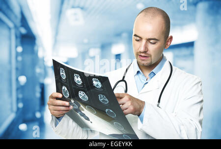 portrait of caucasian doctor check xray Stock Photo