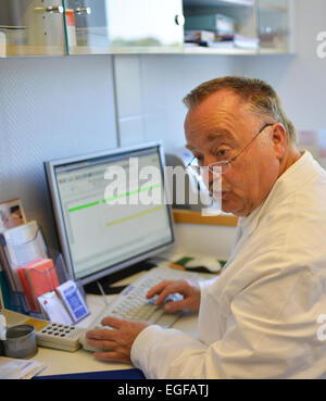 The family doctor – here in his surgery – fulfils an important task in the health system, whether during consultation or home vi Stock Photo