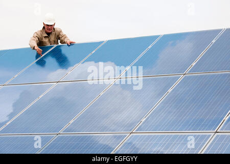 Working On Solar Panels Stock Photo