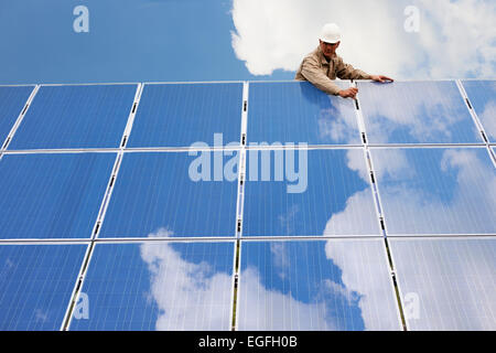 Working On Solar Panels Stock Photo