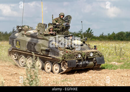 British Army Alvis FV103 Spartan Armoured Personnel Carrier on Salisbury Plain Military Training Area, Wiltshire, United Kingdom Stock Photo