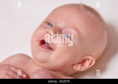 3 month old baby smiling Stock Photo