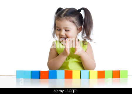 Little girl with toy blocks Stock Photo