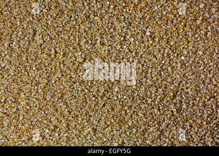 A very close view of granulated sugar with cinnamon spice. Stock Photo