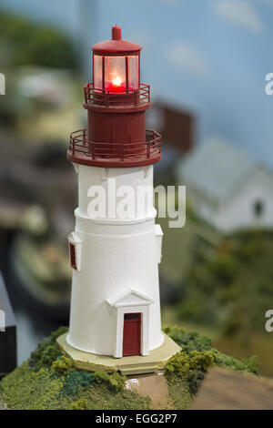 Hicksville, New York, USA. 22nd Feb, 2015. A model Light House, red and white and built from scratch, is one of the scenes at the Model Train Exhibit hosted by Trainville Hobby Depot at the Broadway Mall. Donations were accepted at exhibit to support the Nassau County Empire State Games for the Physically Challenged. © Ann Parry/ZUMA Wire/Alamy Live News Stock Photo