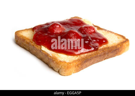 toast with butter and strawberry jam on a white background Stock Photo