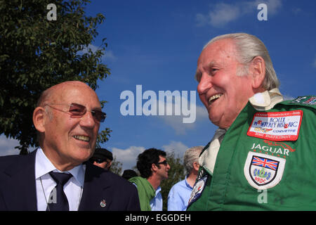 Sir Stirling Moss enjoys a moment with Norman Dewis, former Jaguar works driver and development engineer / Goodwood Revival / UK Stock Photo