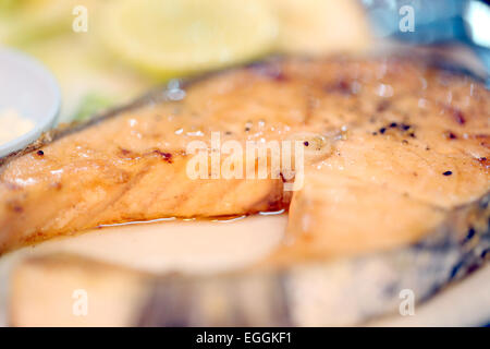 Salmon steaks on the dish in blur style. Stock Photo
