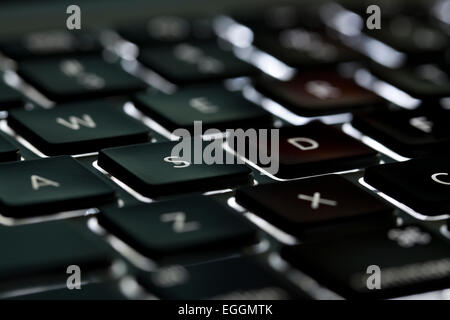 Illuminated Apple Macbook Pro keyboard - USA Stock Photo