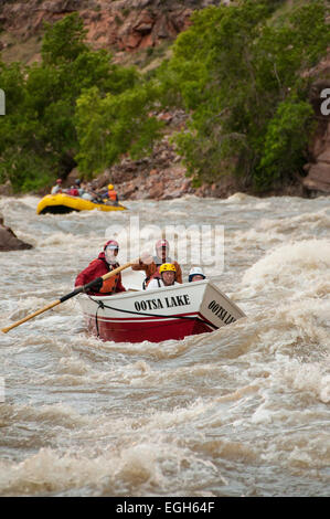 Dory and raft row through Warm Springs Rapid, Yampa River, Dinosaur National Monument, Colorado. Stock Photo