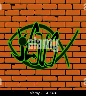 Graffiti depicting a Christian fish on a brick built wall with the word Jesus Stock Photo
