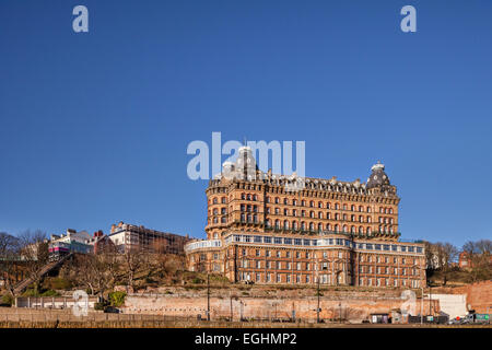 The Grand Hotel in Scarborough, North Yorkshire, on a sunny winter day. Completed in 1867, the hotel is a Grade II* Listed ... Stock Photo