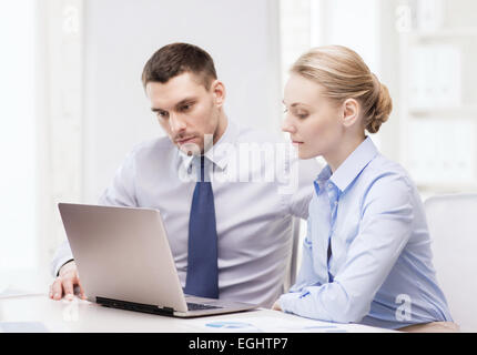 business team working with laptop in office Stock Photo