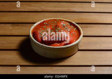 Roasted Red Peppers Stuffed with a Goat Cheese and Caper Mousse Stock Photo