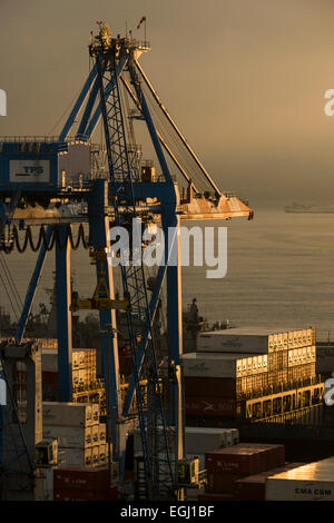 View of city and ports at dawn from Paseo 21 de Mayo, Cerro Playa Ancha, Valparaíso, Central Coast, Chile Stock Photo