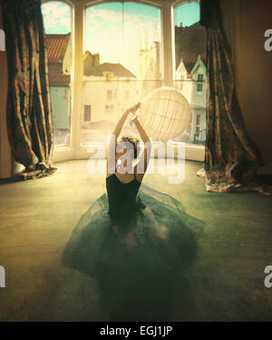 young female dancer siting on the floor Stock Photo