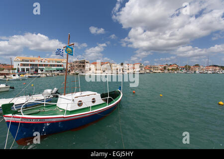 Town of Lixouri, Kefalonia. Picturesque view of traditional Greek fishing boats (Caïque’s) moored in Lixouri harbour. Stock Photo