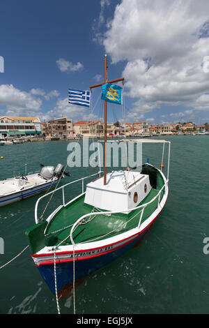 Town of Lixouri, Kefalonia. Picturesque view of traditional Greek fishing boats (Caïque’s) moored in Lixouri harbour. Stock Photo