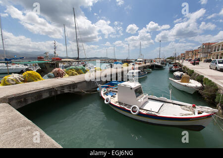 Town of Lixouri, Kefalonia. Picturesque view of traditional Greek fishing boats (Caïque’s) moored in Lixouri harbour. Stock Photo