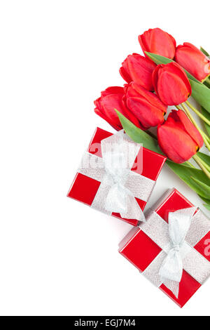 Fresh red tulips with gift boxes. Isolated on white background Stock Photo