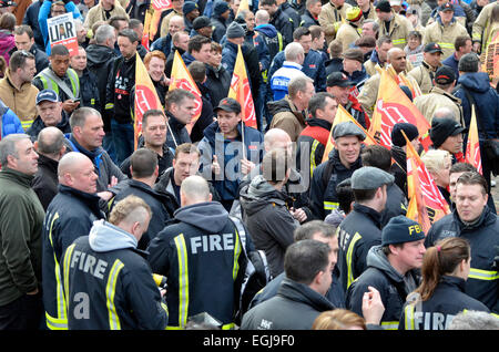 London, UK. 25th Feb, 2015. Striking firefighters gather in Westminster to protest against the Government's and Fire Minister Penny Mordaunt's changes to firefighters' pensions. Credit:  PjrNews/Alamy Live News Stock Photo