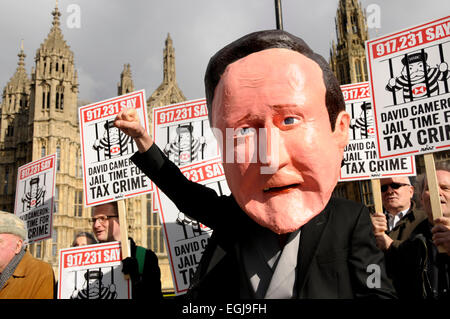 London, UK. 25th February, 2015. Demonstration organised by AVAAZ (The World In Action) in Westminster against tax dodging. 'Jail Time for Tax Crime'. Credit:  PjrNews/Alamy Live News Stock Photo
