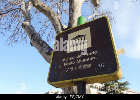 Sign indicating direction to Prado Museum, in English, Japanese and spanish, Madrid, Spain. Stock Photo