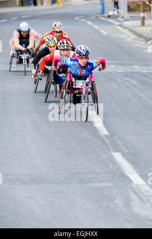 disabled athletes taking part in the london marathon wheelchair race Stock Photo
