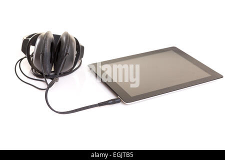 Headphones connected to a last generation tablet computer Stock Photo