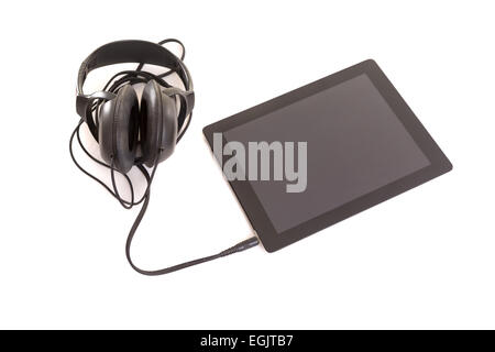 Headphones connected to a last generation tablet computer Stock Photo