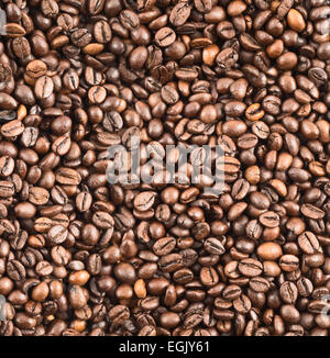 Coffee bean surface as a seamless background Stock Photo