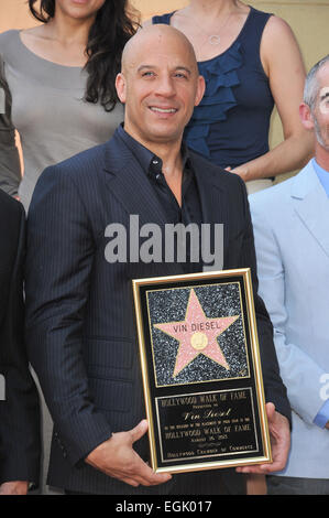 LOS ANGELES, CA - AUGUST 26, 2013: Vin Diesel on Hollywood Blvd where he was honored with the 2,504th star on the Hollwood Walk of Fame. Stock Photo