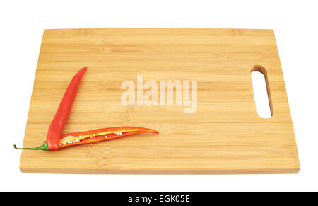 Sliced chili pepper over a cutting board Stock Photo