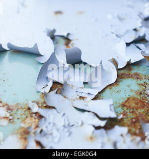 Blue paint flakes falling off Stock Photo